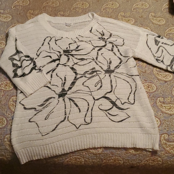 White sweater with Black flower design. - Picture 3 of 4